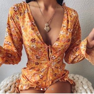 Orange floral romper
